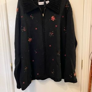 Gorgeous, black poinsettia sweater